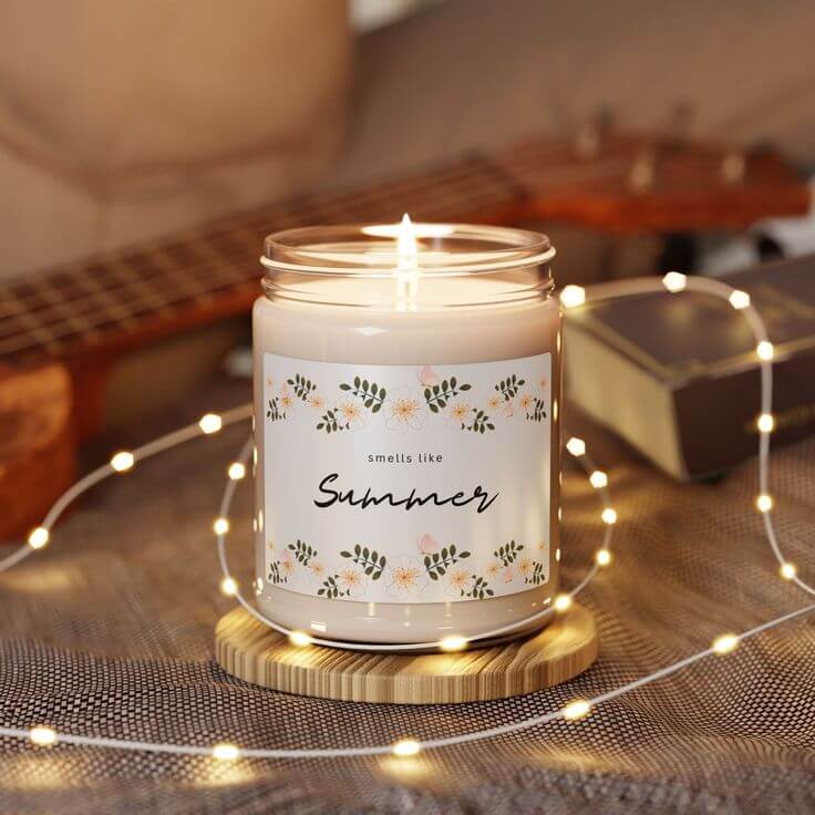 candle with a label that says 'smells like Summer', representing a summer skincare routine ambiance.