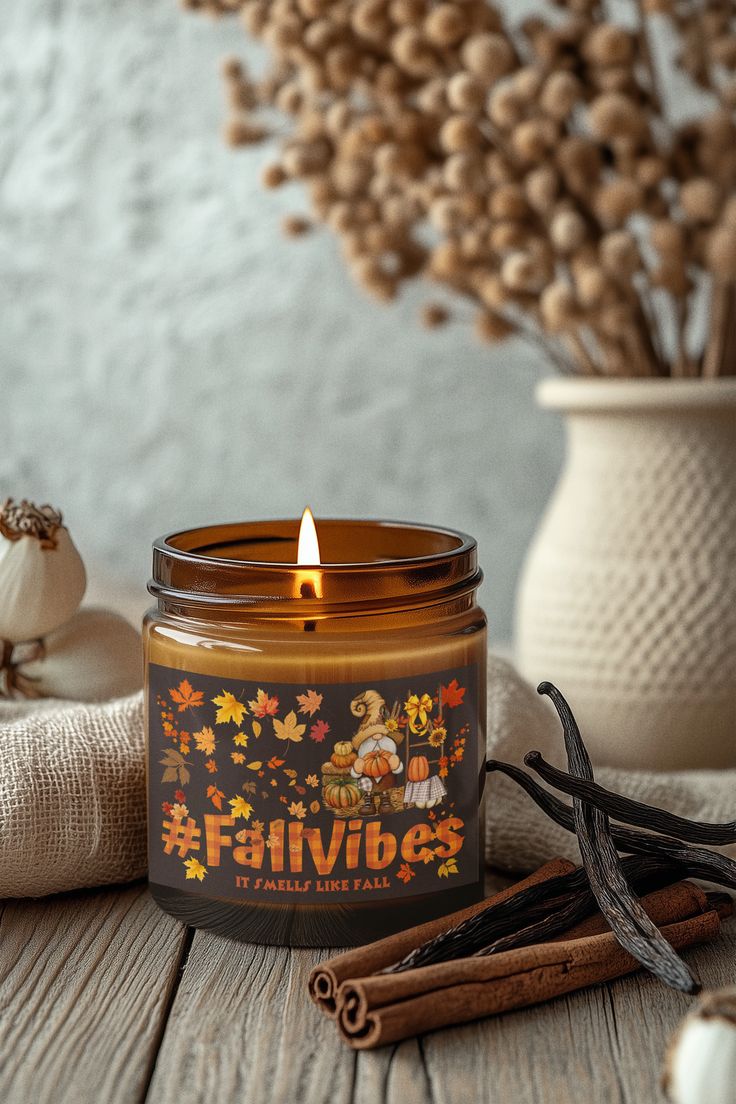 Fall Candles featuring a warm glow with autumn decor and spices, creating a cozy fall ambiance.