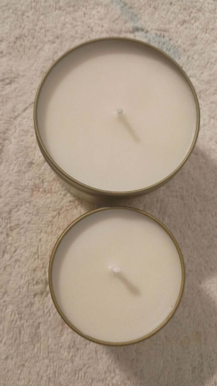 Vanilla Whisper Candle – two sizes of hand-poured soy candles with soft white wax and cotton wicks.